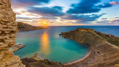 Ġnejna Bay near Mġarr at sunset