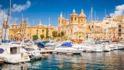 Yachts moored in Vittoriosa marina below St Lawrence's Church