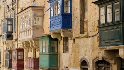 Colourful wooden gallariji balconies on St Paul's Street, Valletta