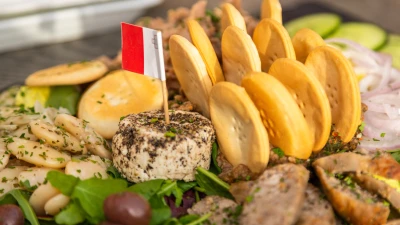 Traditional Maltese platter with cheese, beans, sausage and biscuits, served in Birgu