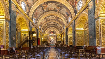 The richly decorated nave and ceiling frescoes of St John's Co-Cathedral